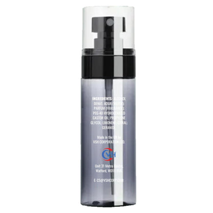 Translucent grey spray bottle of THEM Agua de Colonia with a clear cap and white ingredient label on a white background.