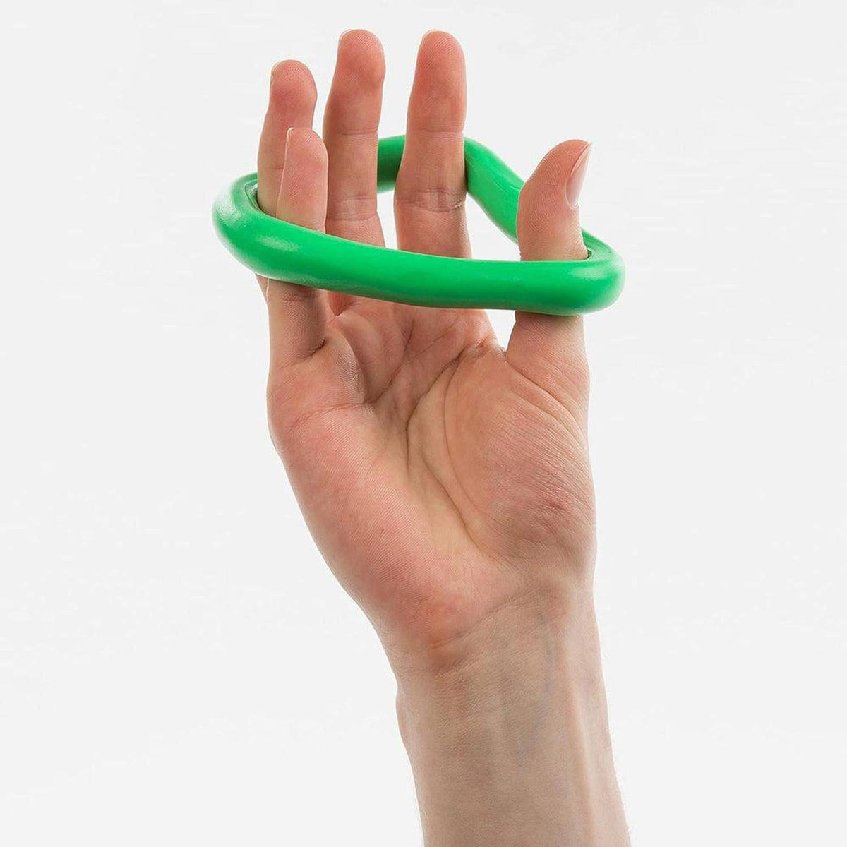 Hand stretching a loop of bright green, smooth therapy putty for hand strengthening and rehabilitation exercises.