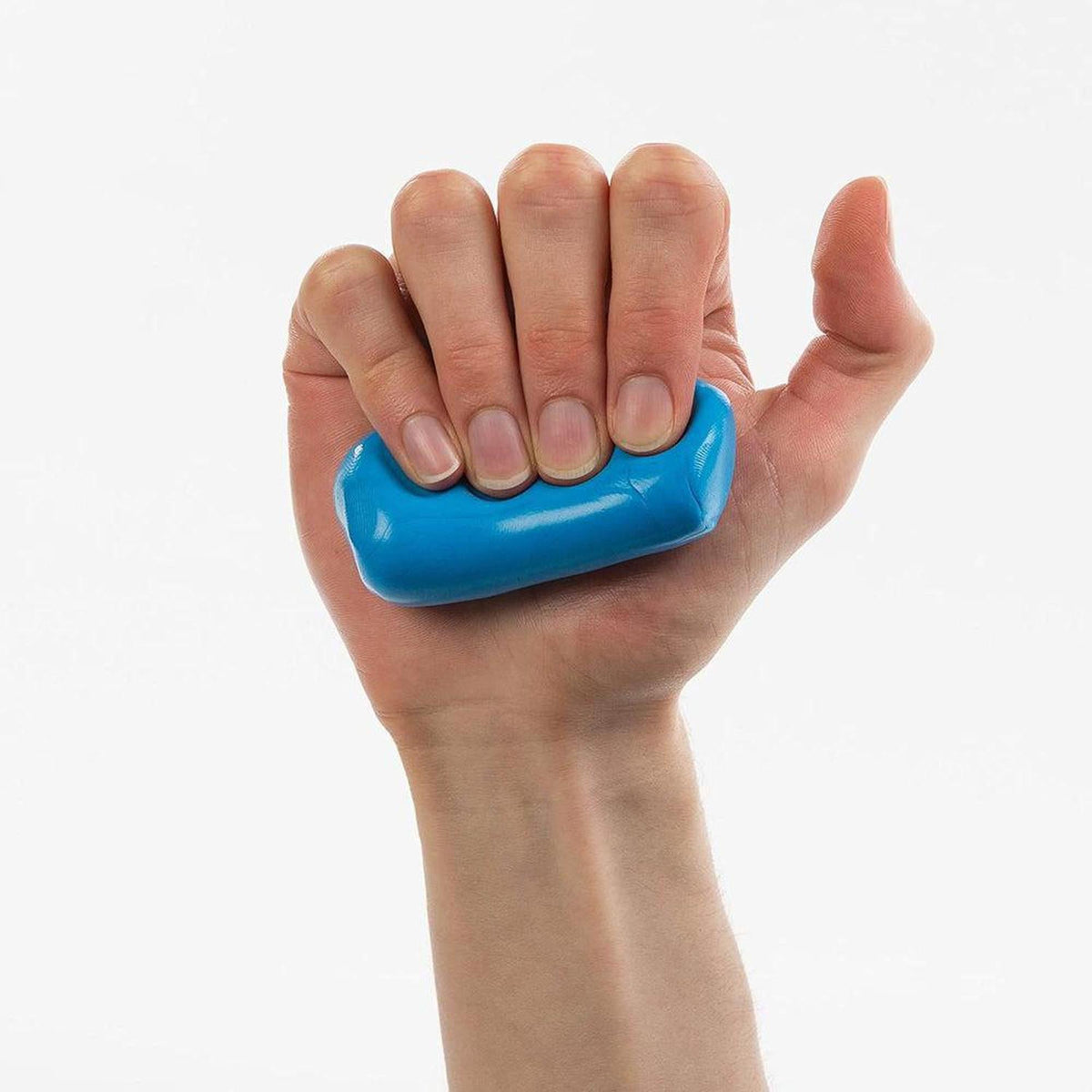 Hand squeezing a smooth, bright blue therapy putty for hand strength and fine motor rehabilitation.