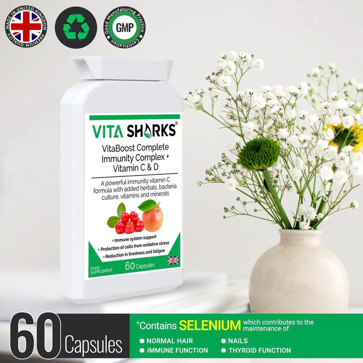 White bottle of VitaBoost 60 capsules with green label, featuring fruit illustrations next to a vase of white flowers.