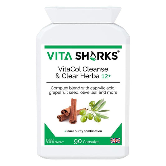 White bottle of VitaCol Cleanse & Clear Herba 12+ capsules with green branding, cinnamon sticks, and olives on the label.