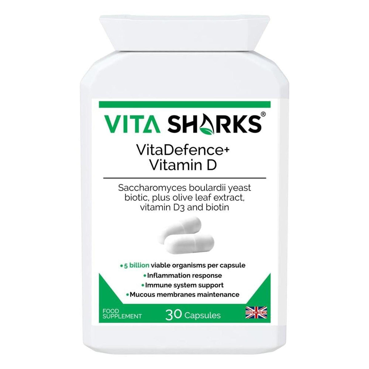 White plastic bottle of VitaDefence+ Vitamin D capsules with green branding and 30-capsule label details.