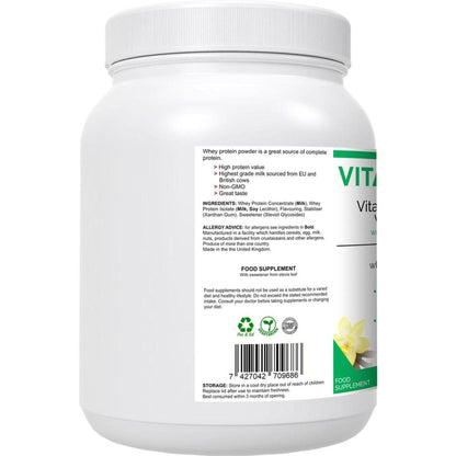 White plastic tub of VitaNourish Whey Vanilla protein powder showing the ingredient label and nutrition information.