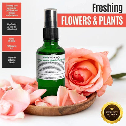 VitaPure 50ml colloidal silver spray bottle in a wooden bowl with pink roses and informative product feature overlays.