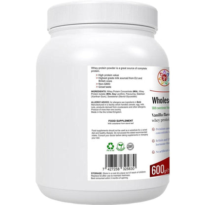 White 600g tub of Wholesome Whey Vanilla protein powder with a detailed ingredient and nutrition label.