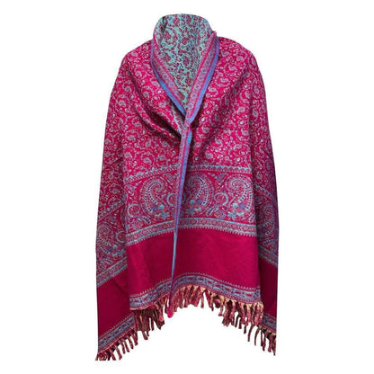 Reversible magenta and teal yak wool shawl featuring intricate paisley patterns and decorative fringe trim.