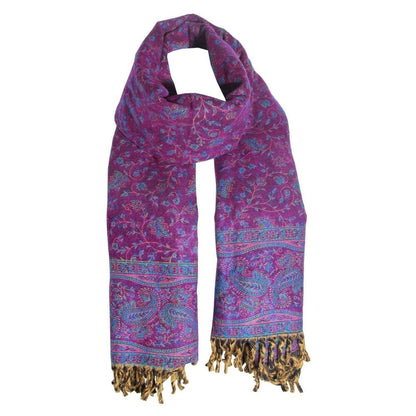 Purple yak wool shawl featuring intricate blue and gold paisley floral patterns with tasseled fringe ends.